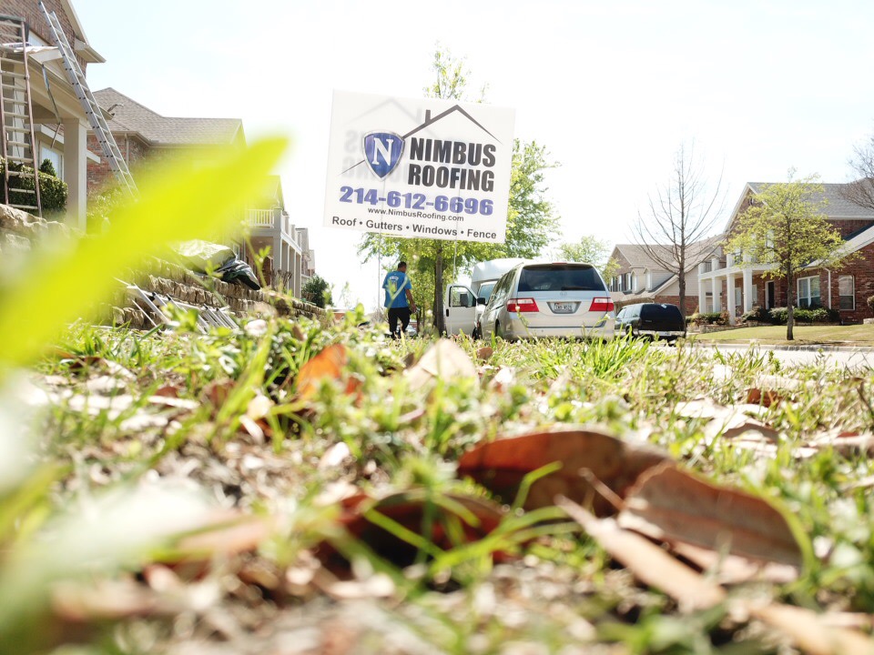 Ground-level view of Nimbus Roofing crew at work - Professional installation team